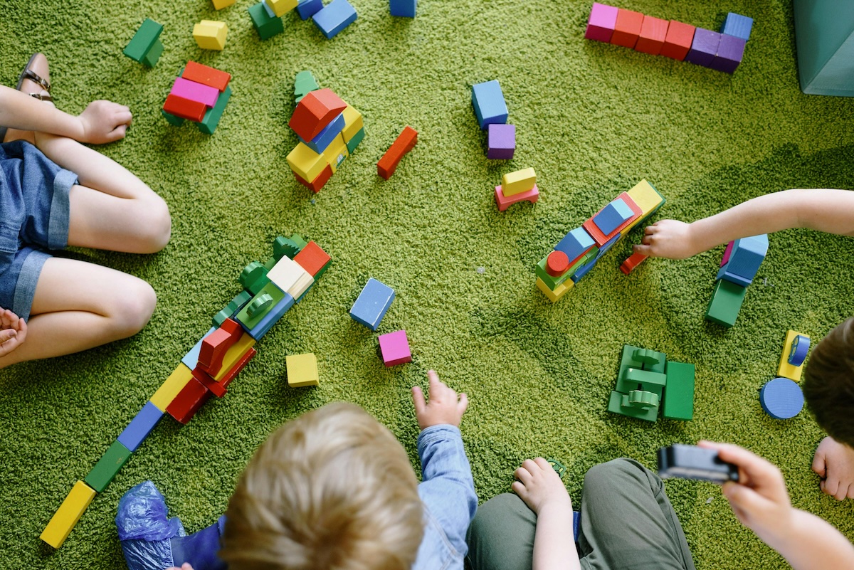 Children playing together cooperatively in a sensory-friendly space